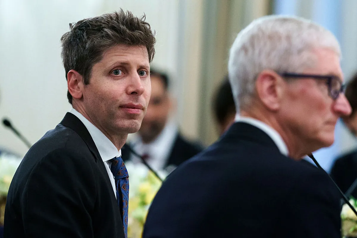 Apple CEO Tim Cook and OpenAI CEO Sam Altman at a joint event in 2024